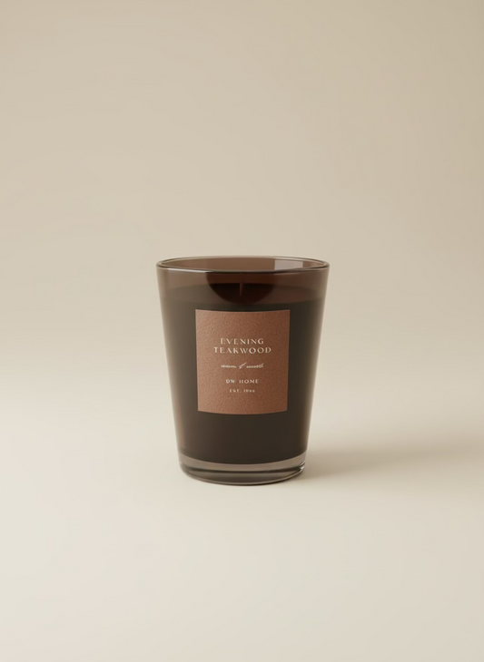 Candle with a label on a beige background